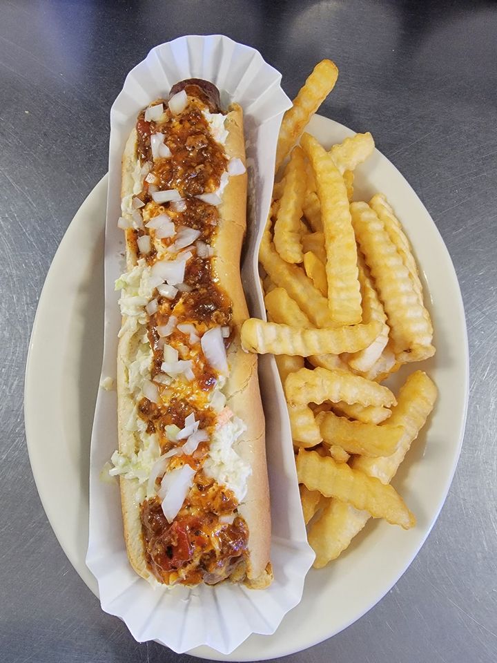 Footlong hot dog with chili, slaw and onions, with French fries